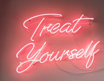 Treat Yourself neon sign